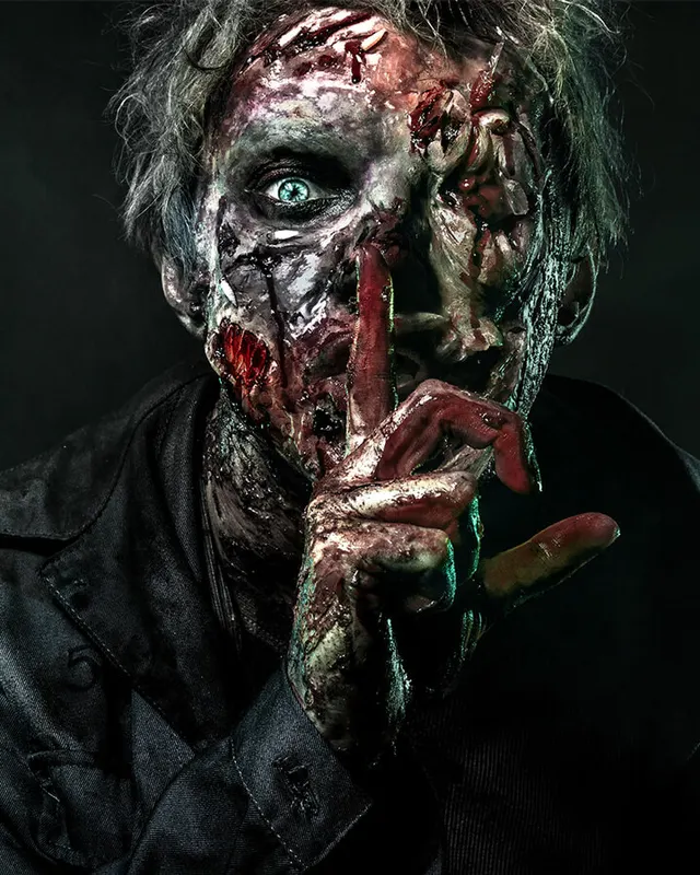 A Scarizona pierrot clown character portrait in full costume and makeup